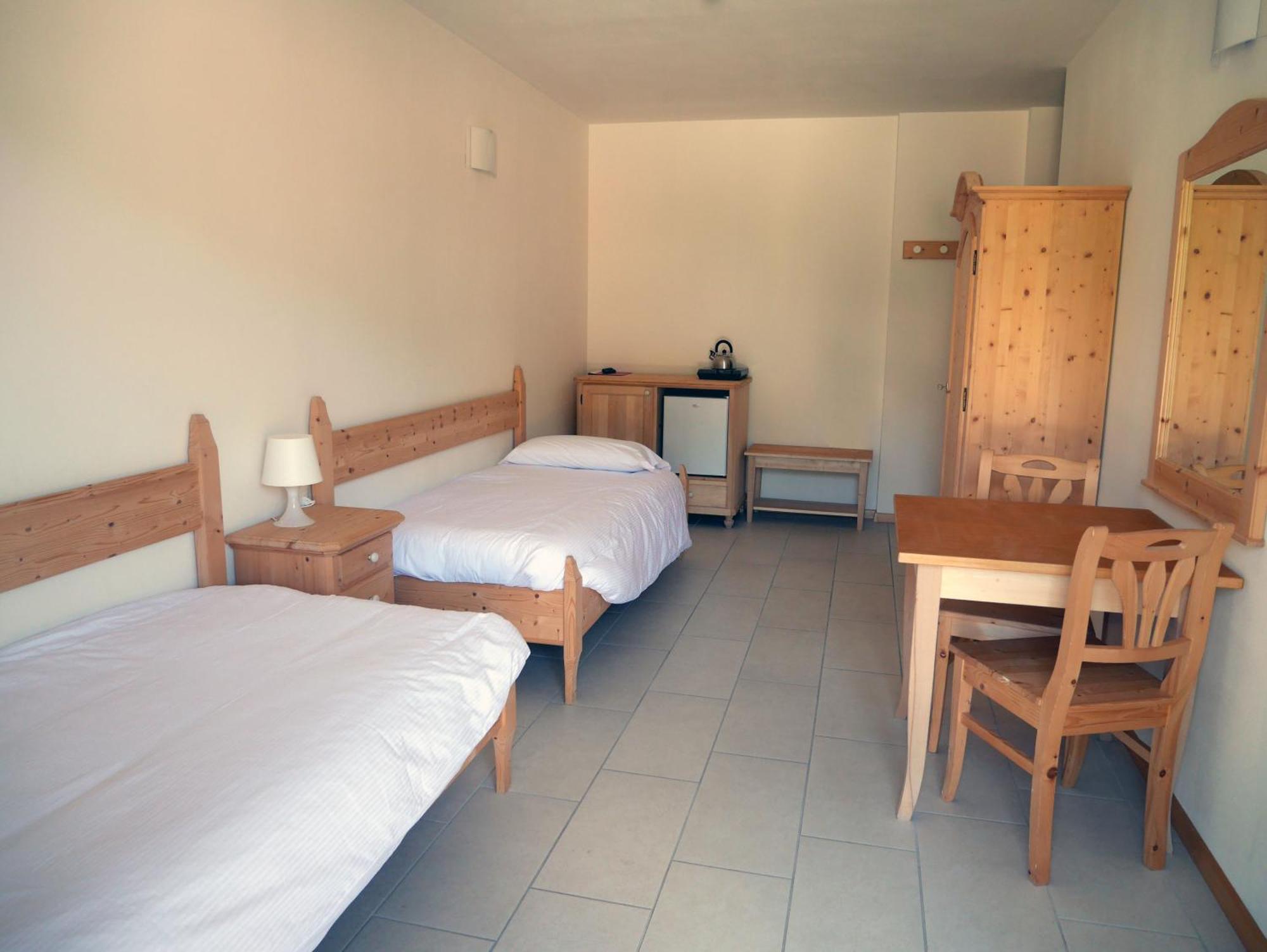 Hotel Elbele Garni Folgaria Quarto foto